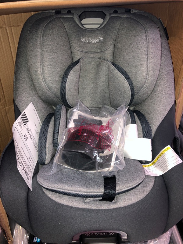 Photo 2 of Baby Jogger City Turn Convertible Car Seat, Phantom Grey
