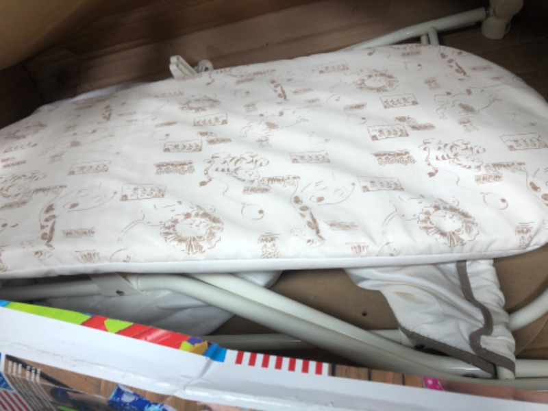 Photo 1 of baby beige bassinet