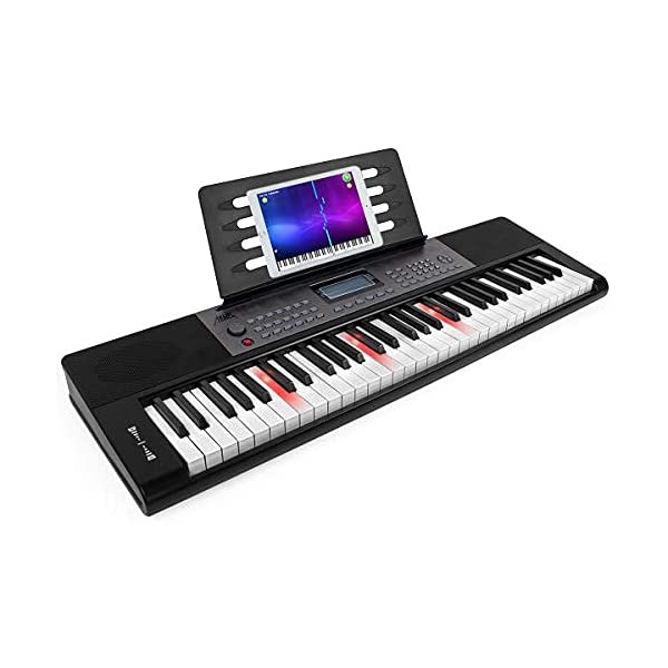 Photo 1 of AKLOT 61-Key Keyboard Piano Portable Electronic Keyboard for Adult Beginners With Keyboard Teach Indicator

**tested, some black keys stuck**powers on, working
