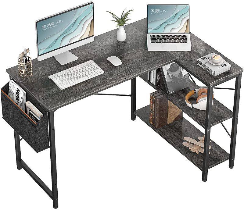 Photo 1 of MISSING SOME HARDWARE*
Small L Shaped Computer Desk, Homieasy 47 Inch L-Shaped Corner Desk with Reversible Storage Shelves for Home Office Workstation, Modern Simple Style Writing Desk Table with Storage Bag(Black Oak)
