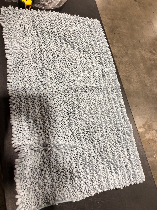 Photo 1 of 40x25in bath rug blue 