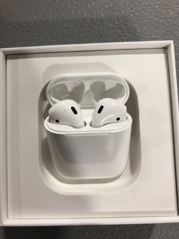 Photo 2 of Apple AirPods (2nd Generation) Wireless Earbuds with Lightning Charging Case Included. Over 24 Hours of Battery Life, Effortless Setup. Bluetooth Headphones for iPhone
