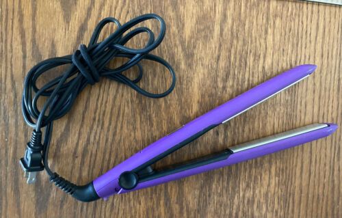 Photo 1 of REMINGTON HAIR STRAIGHTENER
