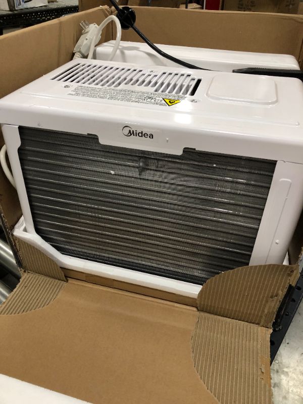 Photo 4 of Midea 8,000 BTU U-Shaped Smart Inverter Window Air Conditioner–Cools up to 350 Sq. Ft., Ultra Quiet with Open Window Flexibility, Works with Alexa/Google Assistant, 35% Energy Savings, Remote Control---SOLD FOR PARTS
