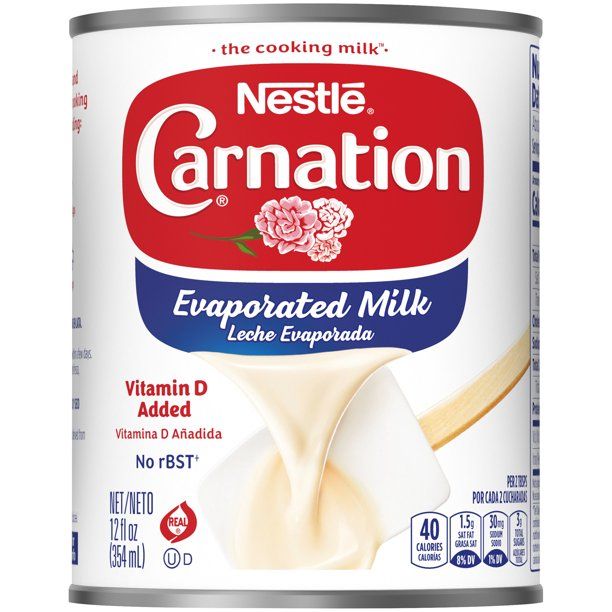 Photo 1 of CARNATION Evaporated Milk 12 Fluid Ounce Each 24 Cans per Case, BEST BY 01 FEB 2022
