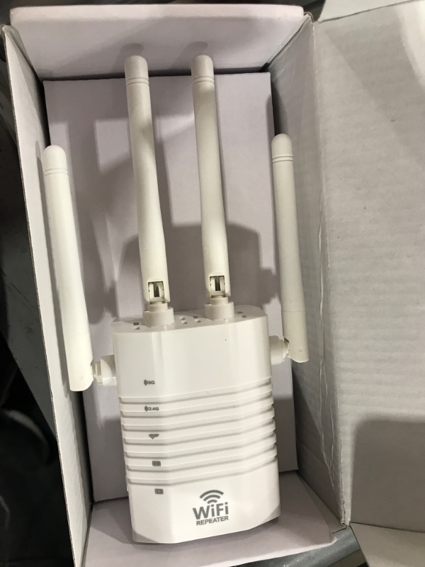 Photo 2 of 2022 WiFi Extender - Wireless Signal Repeater Booster up to 6000 sq.ft - 1200Mbps Wall-Through Strong WiFi-Dual Band 2.4G and 5G - 4 Antennas 360° Full Coverage
