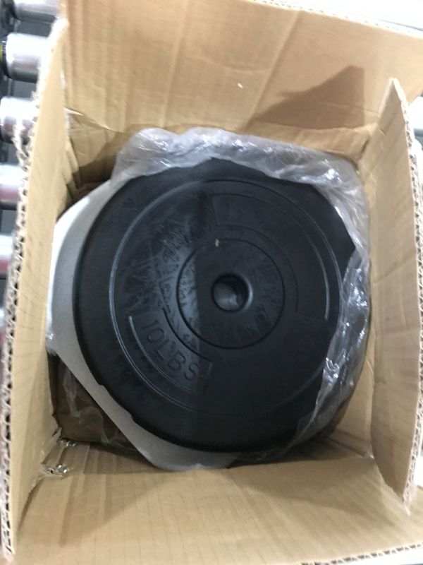 Photo 1 of 2 pack of 10lbs weight disc cement