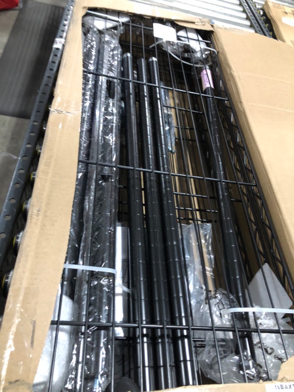 Photo 2 of Amazon Basics 4-Shelf Adjustable, Heavy Duty Storage Shelving Unit on 3'' Wheel Casters, Metal Organizer Wire Rack, Black (36L x 14W x 57.75H)
