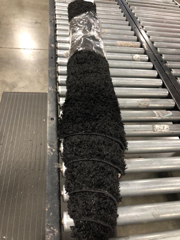 Photo 1 of 4'x5'5 Shag Rug Black - Room Essentials
