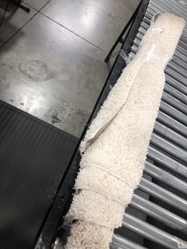 Photo 1 of 4'x5'5 Shag Rug Ivory - Room Essentials
