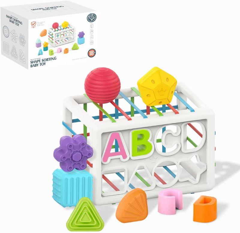 Photo 1 of Baby Shape Sorting Toy,Kids Montessori Toys-Sensory Sorting Bin with Elastic Bands,with Colorful Cube and 8 Pcs Multi-Sensory Shape Educational and Fun Toys,Kids Toys for Ages 18 Months and Over
