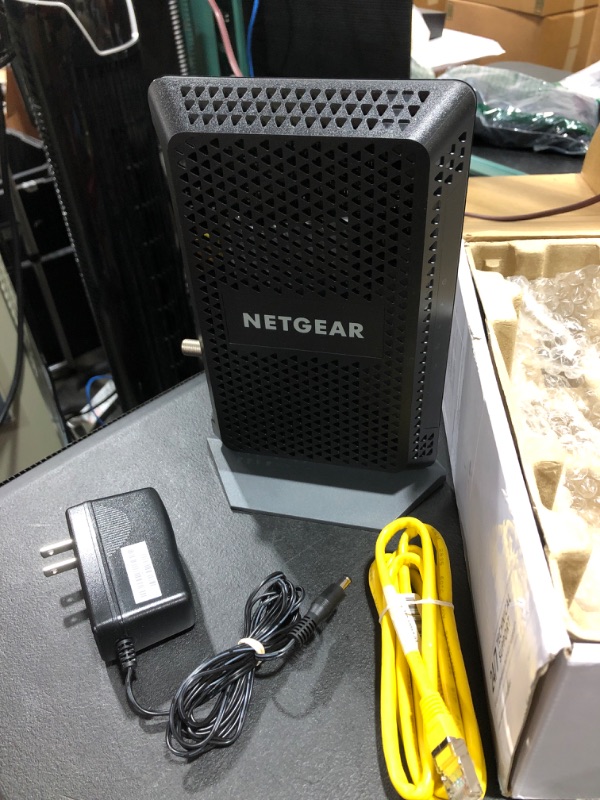 Photo 2 of NETGEAR CM600 (24x8) DOCSIS 3.0 Cable Modem. Max Download speeds of 960Mbps. Certified for XFINITY by Comcast, Time Warner Cable, Cox, Charter & More (CM600)