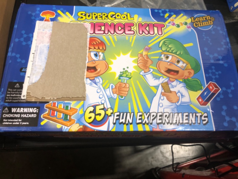 Photo 1 of Learn and Climb Science Kit for Kids - Set Includes Over 65 Science Experiments + Scientist Name tag!