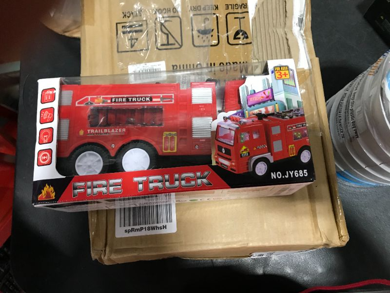 Photo 2 of Electric Fire Truck Kids Toy - with Bright Flashing 4D Lights and Real Siren Sounds Bump and Go Firetruck for Boys Automatic Steering on Contact Fire Engine Toy Trucks for Imaginative Play…