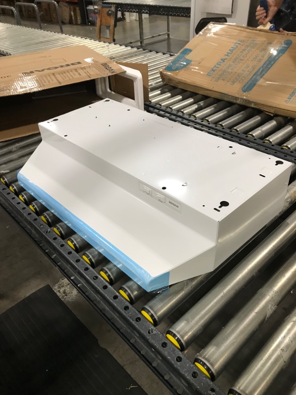 Photo 2 of Broan-NuTone 403001 Convertible Range Hood Insert with Incandescent Light, Exhaust Fan for Under Cabinet, White, 6.5 Sones, 160 CFM, 30" & Broan-NuTone S97007696 Filter
