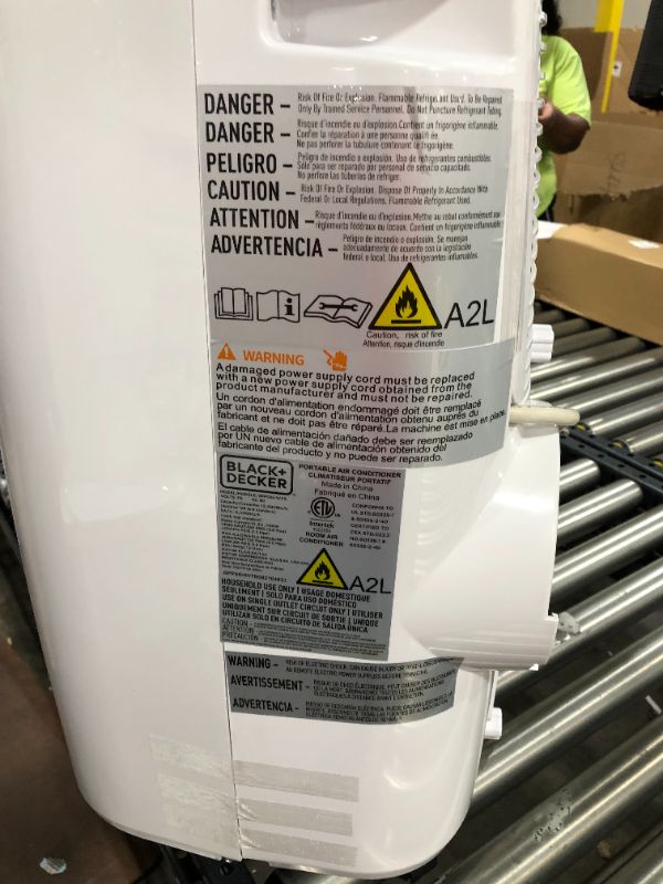 Photo 1 of BLACK+DECKER 12,000 BTU Portable Air Conditioner with Heat and Remote Control, White
