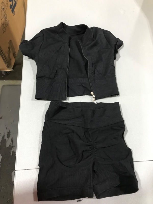 Photo 1 of **No size available** Black spandex 2 piece outfit. Jacket and shorts.