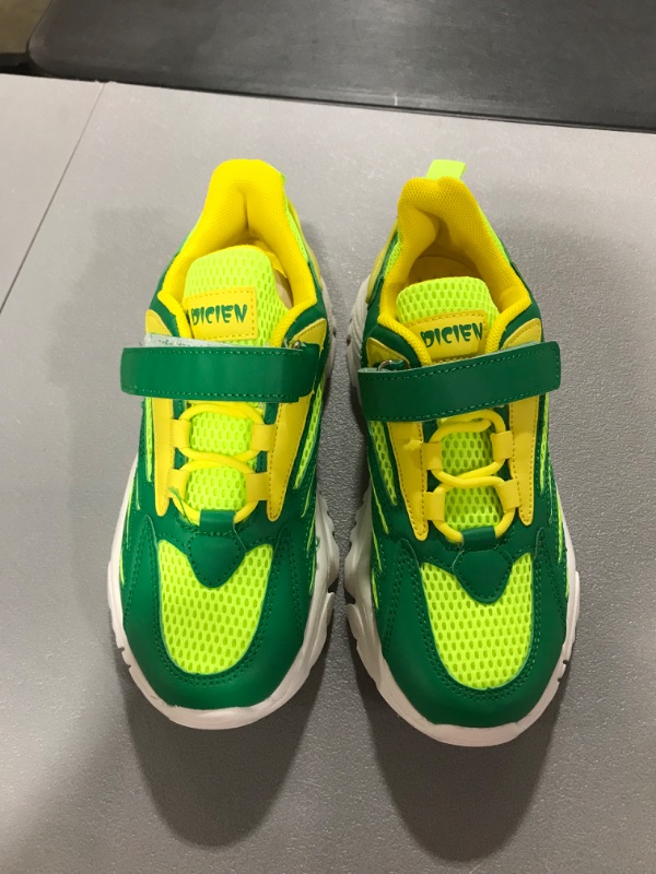 Photo 1 of  size 35 NON US SIZE Yellow and green tennis shoes 