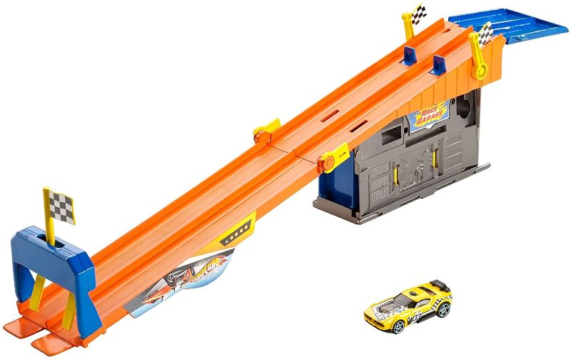 Photo 1 of Hot Wheels Rooftop Race Garage Playset, Race to the Finish Line then Pull Into the Garage for a Tune-up with the Rooftop Race Garage! , Orange
