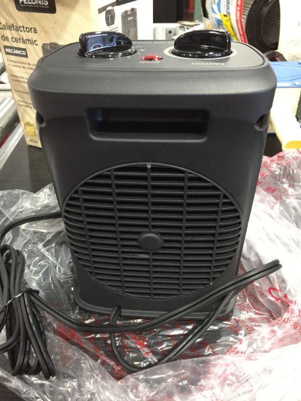 Photo 1 of 1500-Watt 9 in. Electric Personal Ceramic Space Heater with Thermostat
