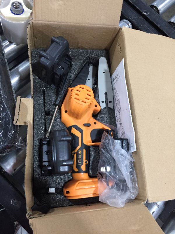 Photo 1 of 4 Inch Electric Small handheld Chain saw Kit