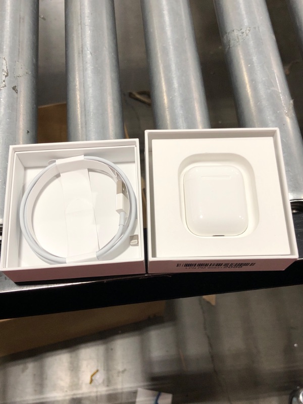 Photo 2 of Apple AirPods with Charging Case (Latest Model)