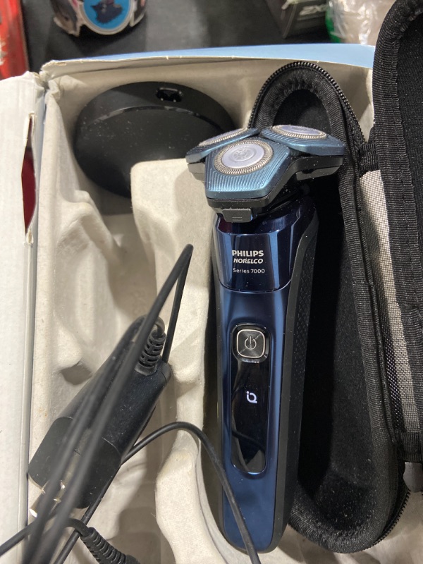 Photo 2 of Philips Norelco Shaver 7700, Rechargeable Wet & Dry Electric Shaver with SenseIQ Technology, Quick Clean Pod, Charging Stand and Pop-up Trimmer, S7782/85
