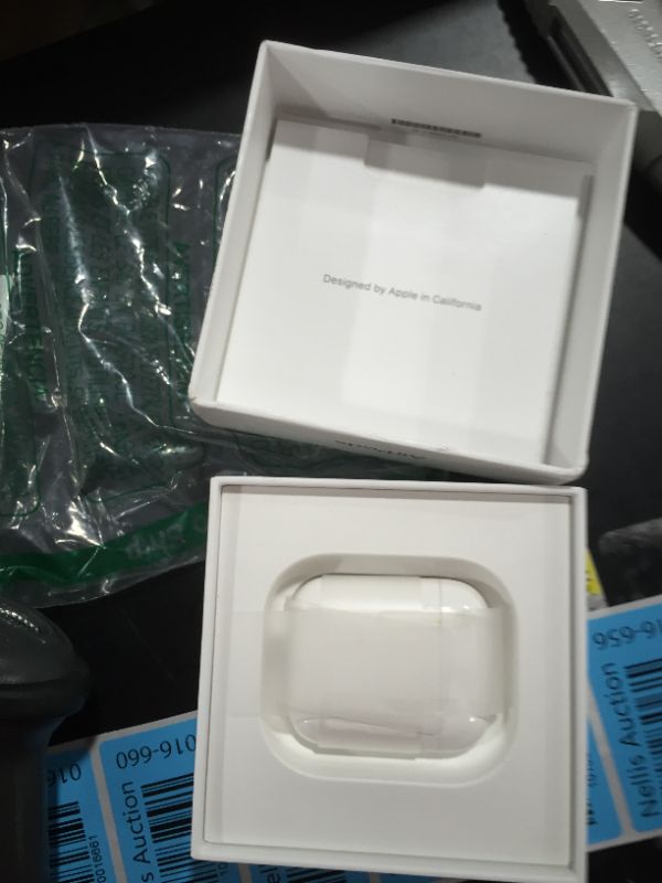 Photo 4 of Apple AirPods with Charging Case (Latest Model)