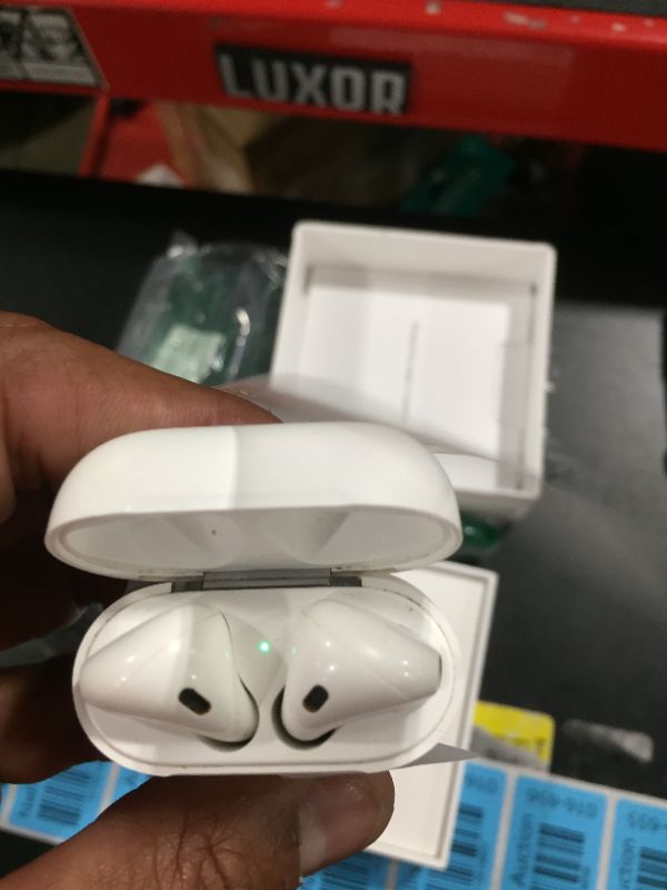 Photo 2 of Apple AirPods with Charging Case (Latest Model)