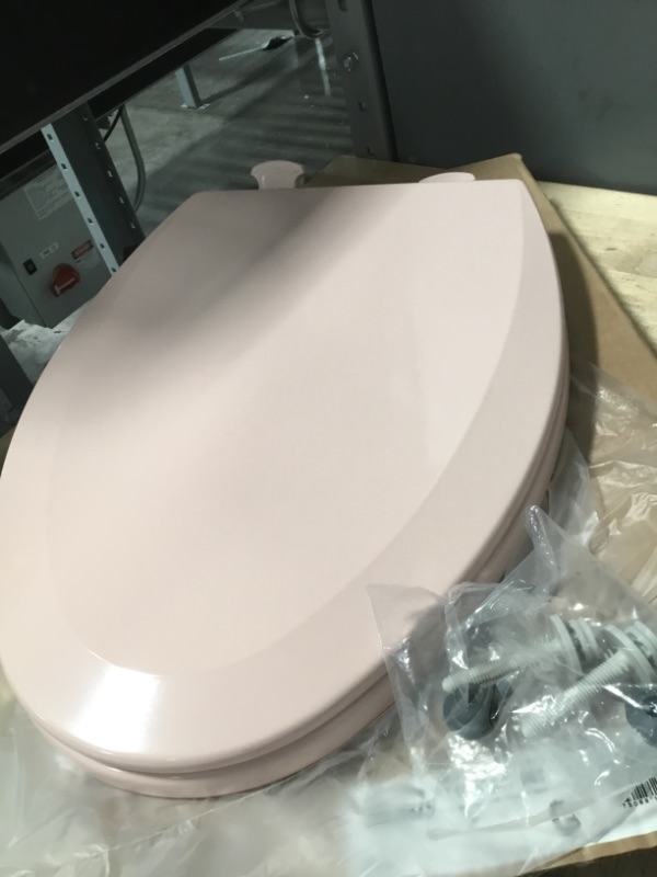 Photo 2 of 
Elongated Closed Front Enameled Wood Toilet Seat in Venetian Pink Removes for Easy Cleaning