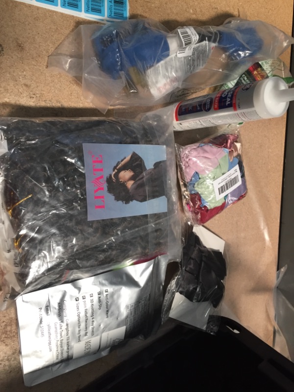 Photo 1 of **NOT REFUNDABLE** BUNDLE OF ASSORTED MISC ITEMS ( HAIR TIES, WIG, HOME GOODS)