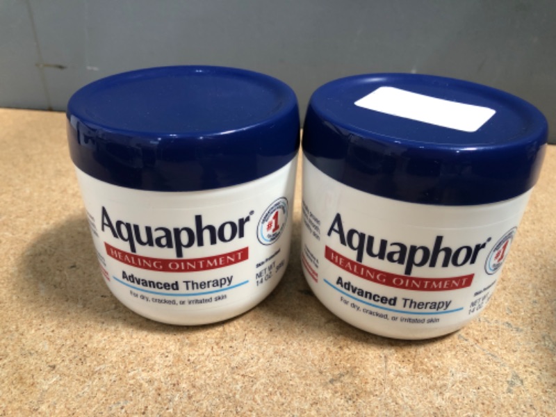 Photo 2 of **EXPIRES JULY 2023** Aquaphor Healing Ointment Advanced Therapy Skin Protectant, Dry Skin Body Moisturizer, 14 Oz Jar (2 PACK)
