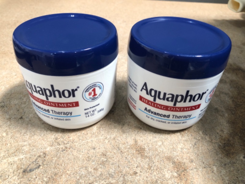 Photo 2 of **EXPIRES JULY 2023** Aquaphor Healing Ointment Advanced Therapy Skin Protectant, Dry Skin Body Moisturizer, 14 Oz Jar (2 PACK)
