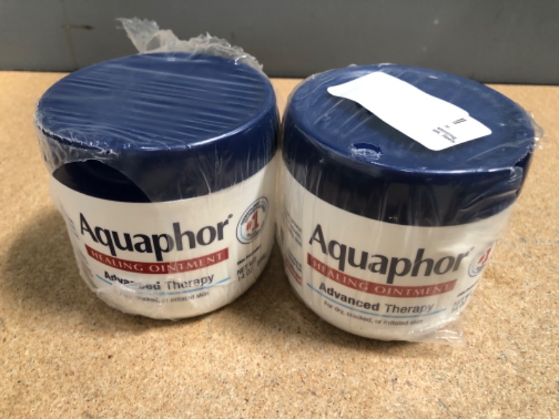 Photo 2 of **EXPIRES JULY 2023** Aquaphor Healing Ointment Advanced Therapy Skin Protectant, Dry Skin Body Moisturizer, 14 Oz Jar (2 PACK)

