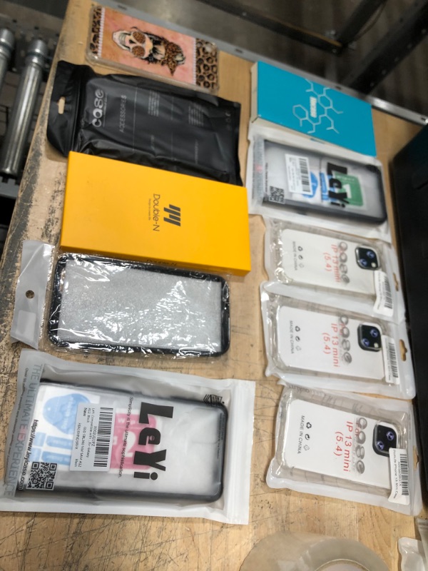 Photo 1 of NO RETURNS NONREFUNDABLE
BUNDLE OF 10 ASSORTED IPHONE CASES
