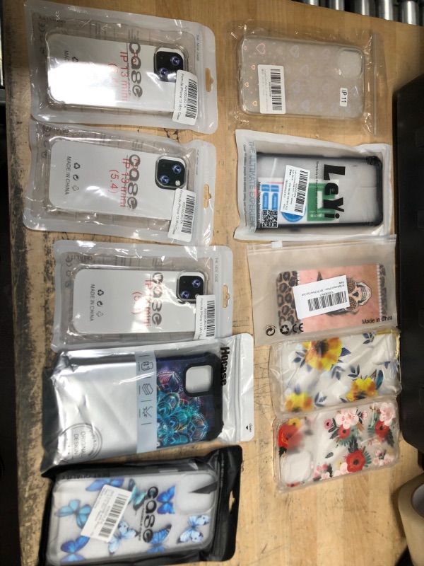 Photo 1 of NO RETURNS NONREFUNDABLE
BUNDLE OF 10 ASSORTED IPHONE CASES
