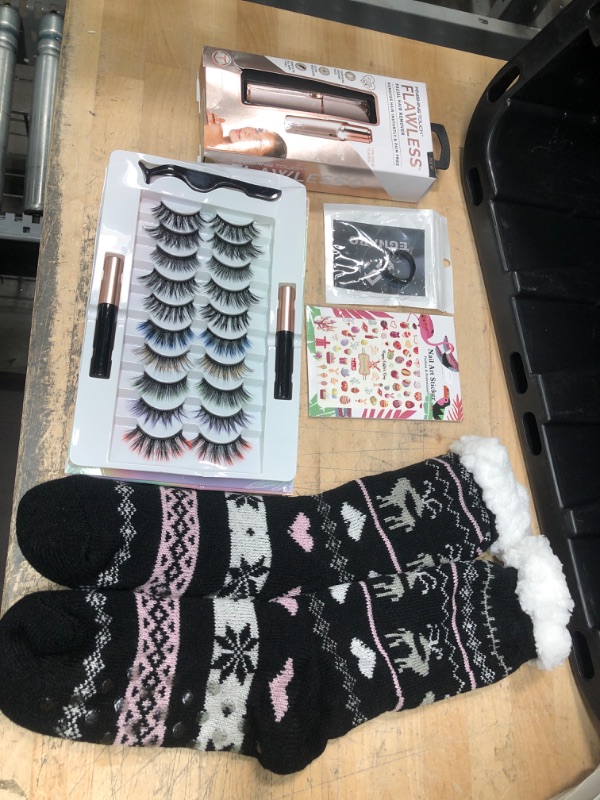 Photo 1 of **nonrefundable bundle of cosmetic goods, eyelashes and socks**