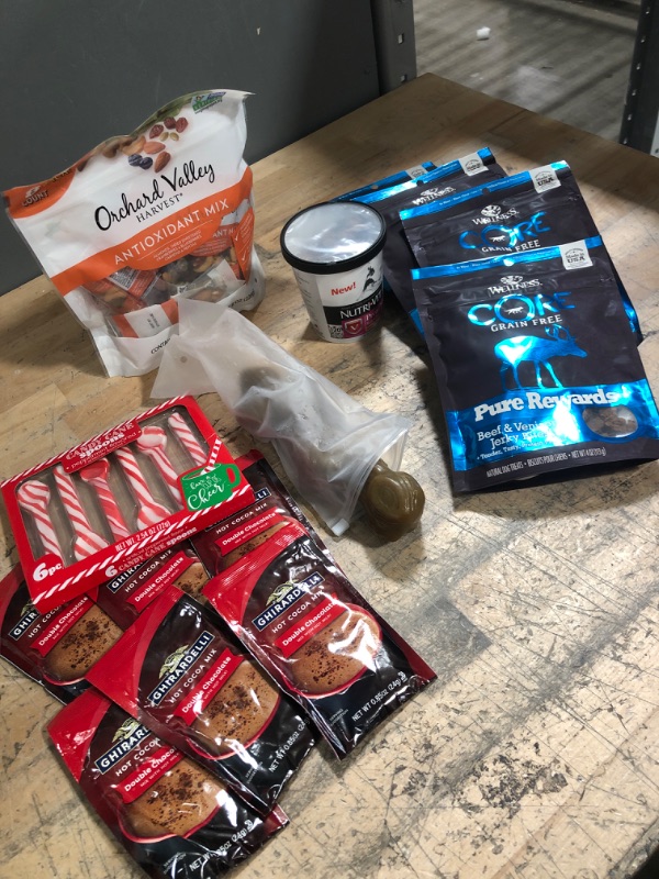 Photo 1 of **BUNDLE OF SNACKS-NO RETURNS-FOR DOGS&HUMANS-BEEF JERKY BITS FOR DOGS BEST BY AUG/22-DOG BONE CHEW TOY/DOG TREATS BEST BY 2/23-HOT COCO WITH CANDY CAINS BEST BY 7/23-ORCHARD VALLEY ANTIOXIDANT MIX BEST BY 7/22*