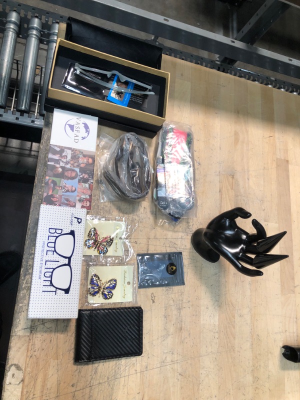 Photo 1 of BUNDLE OF ASSORTED CLOTHING AND APPAREL ACCESSORIES
HAIR BANDS, BLUE LIGHT GLASSES, PINS CARBON FIBER WALLET, RING DISPLAY, ETC
