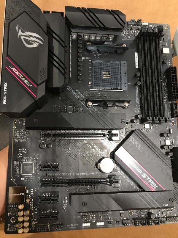 Photo 2 of ASUS ROG Strix B550-F Gaming (WiFi 6) AMD AM4 Zen 3 Ryzen 5000 & 3rd Gen Ryzen ATX Gaming Motherboard (PCIe 4.0, 2.5Gb LAN, BIOS Flashback, HDMI 2.1, Addressable Gen 2 RGB Header and Aura Sync)