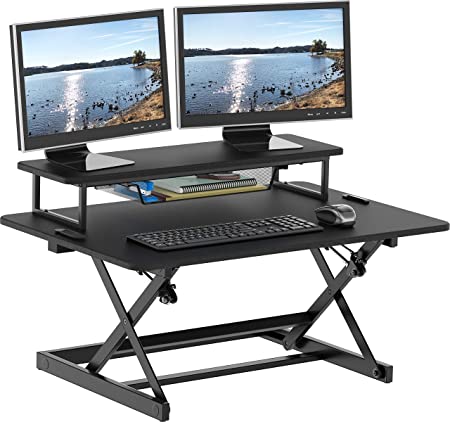 Photo 1 of SHW 36-Inch Height Adjustable Standing Desk Sit to Stand Riser Converter Workstation, Black 24"D x 36"W x 16"H

