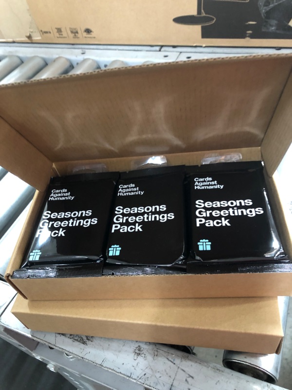 Photo 2 of **2 boxes, each box contains 12 packs**
Cards Against Humanity Seasons Greetings Pack Card Game