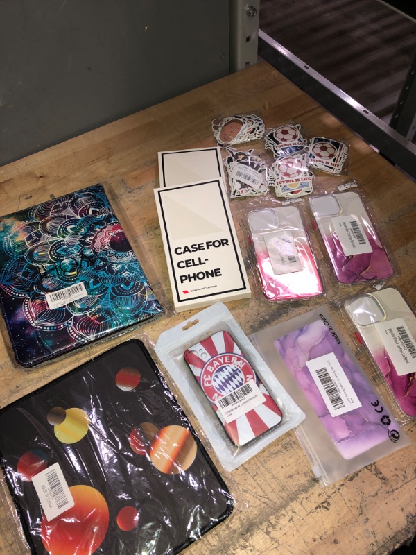 Photo 1 of *BUNDLE OF MIXED ITEMS-PHONE CASES/MOUSE PAD/STICKERS/IKEVER IPAD AIR 4 CASE*