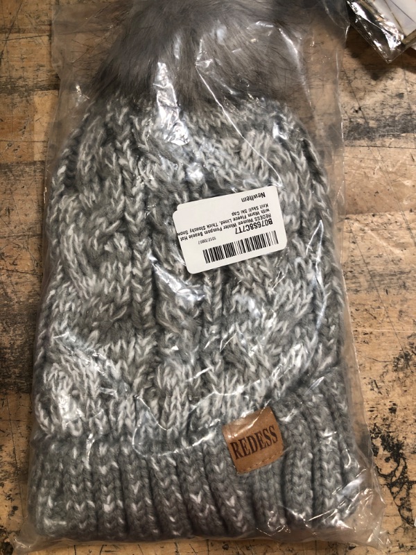 Photo 1 of REDESS Women Winter Pompom Beanie Hat with Warm Fleece Lined, Thick Slouchy Snow Knit Skull Ski Cap
