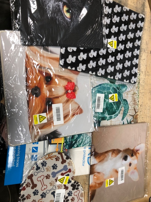 Photo 1 of 7 items- assorted mouse pad bundle 