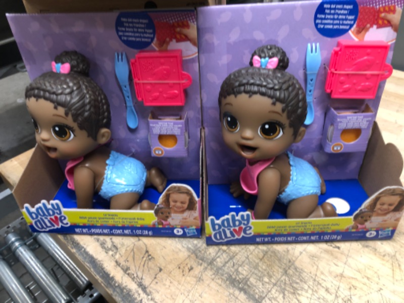 Photo 2 of Baby Alive Lil Snacks Doll with Black Hair Eats and Poops 2-pack 
