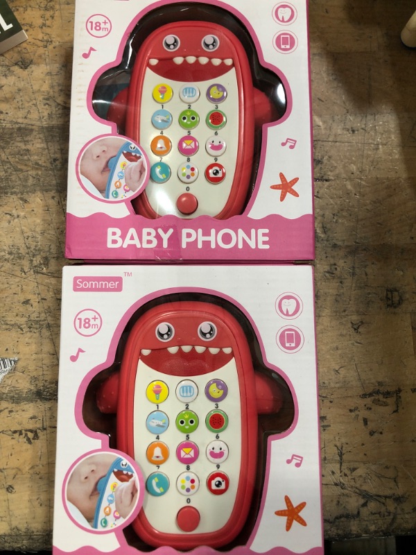 Photo 2 of 2 Baby Shark Cell Phone Toy with Removable Teether Case, Light up, Music & Adjustable Volume Kids Play & Learn Fake Phone for Infant & Toddler, Preschool Birthday Gift for Girl Boy 18+ Months (Red)
