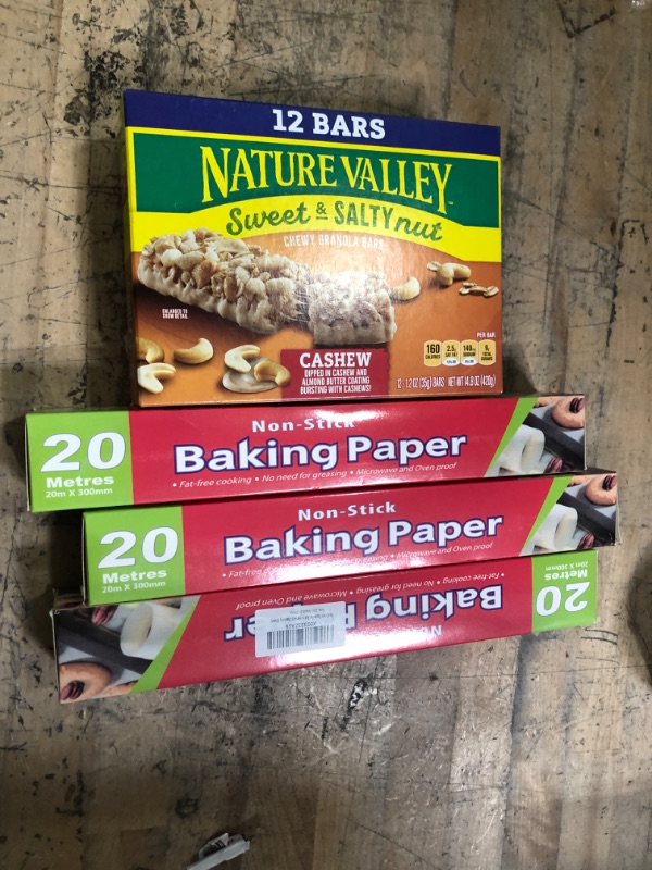 Photo 1 of *** KITCHEN BUNDLE***
3 ROLLS OF BAKING PAPER 
1 BOX OF  Nature Valley Granola Bars, Sweet and Salty Nut, Cashew, 1.2 oz, 12 ct