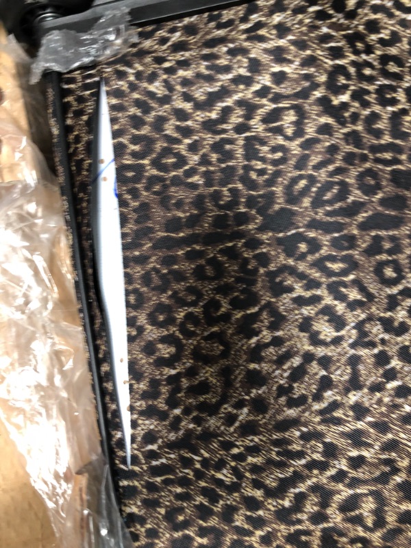 Photo 2 of **main suitcase has 2 large tears**

Rockland Jungle Softside Upright Luggage Set, Leopard, 4-Piece (14/29/24/28)
