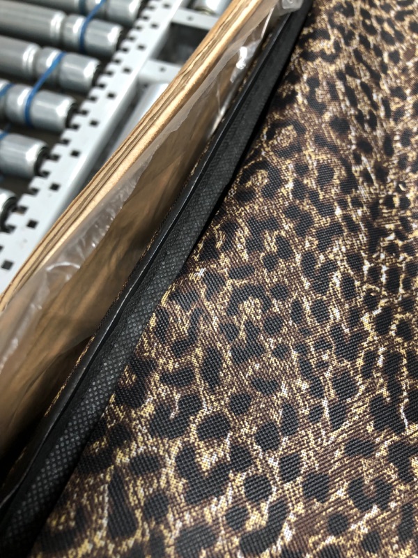 Photo 4 of **main suitcase has 2 large tears**

Rockland Jungle Softside Upright Luggage Set, Leopard, 4-Piece (14/29/24/28)
